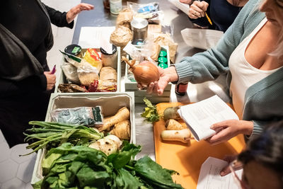 High angle view of people preparing food