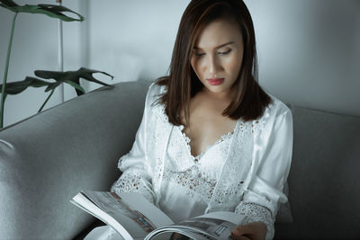 Asian women reading book