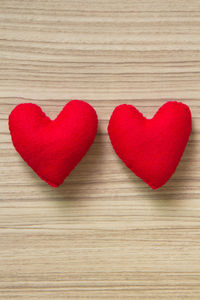 Close-up of heart shape made on wood