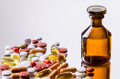 Close-up of bottles against white background