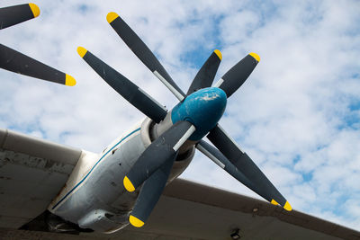 Low angle view of airplane against sky