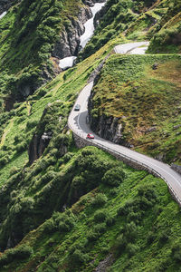 High angle view of alpine road amidst trees