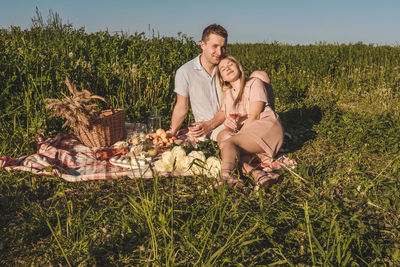 Young couple on field