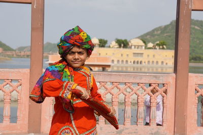 Portrait of boy wearing costume on sunny day