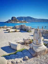 Scenic view of sea against clear blue sky