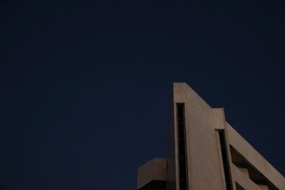 Low angle view of modern building against clear sky