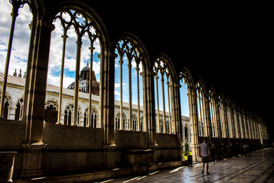 View of temple seen through glass window of building