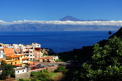 Scenic view of sea against blue sky