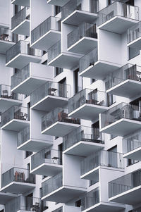 Full frame shot of a white building with balconies