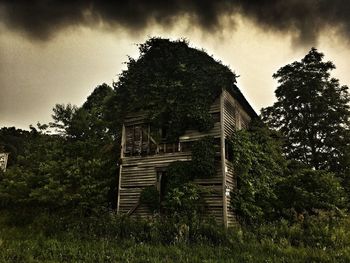 Low angle view of abandoned built structure against sky