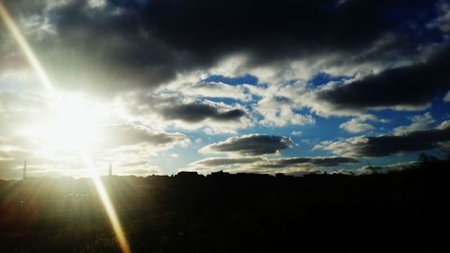 Sun shining through clouds