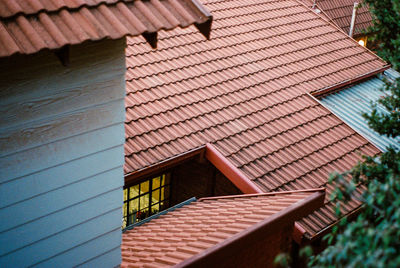 Low angle view of roof and building against sky