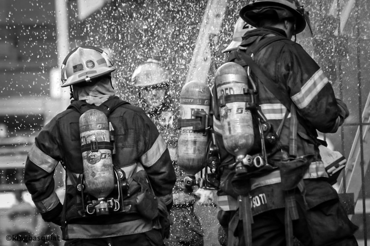 person, uniform, government, clothing, firefighter, protection, men, black and white, headwear, security, helmet, group of people, accidents and disasters, adult, monochrome, occupation, soldier, troop, emergency services occupation, courage, day, work helmet, military, protective workwear, police force, police, armed forces, law, outdoors