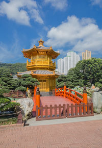 View of temple against building