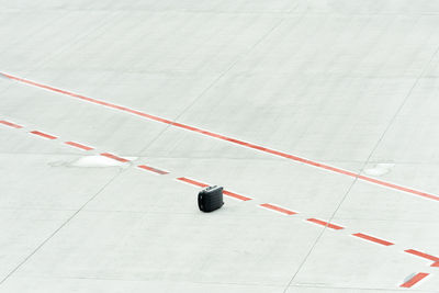 High angle view of suitcase on airport