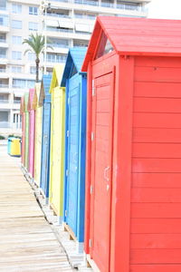 View of beach huts against building