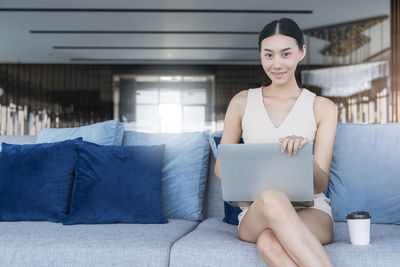 Young woman using mobile phone