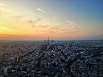 High angle view of city at sunset