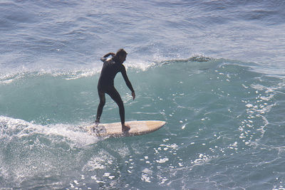 Full length of man at sea shore