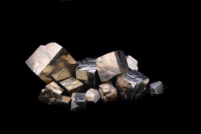 Close-up of rocks against black background