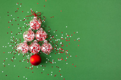 Directly above shot of multi colored candies against blue background