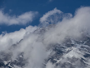 Aerial view of mountain range against sky