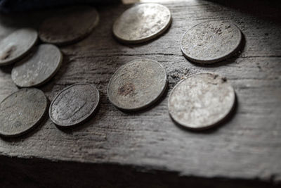 Close-up of coins on table