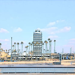 Factory against sky in city