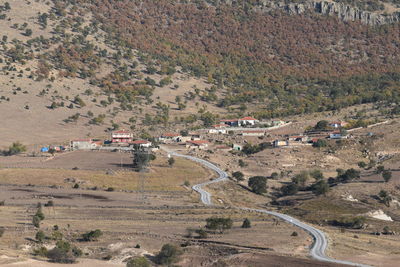 High angle view of road amidst buildings
