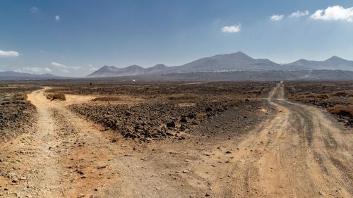 Scenic view of desert against sky