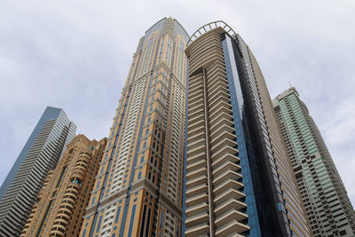 Low angle view of modern buildings against sky