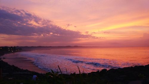 Scenic view of sea against sky at sunset