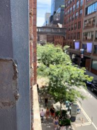 Street by buildings in city
