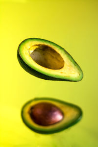 Close-up of banana against yellow background