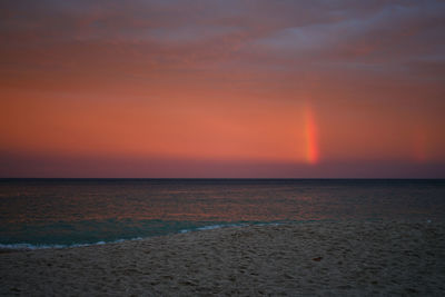 Porthcurno, united kingdom sunset with rainbow