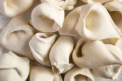 Frozen dumplings-pattern, background, texture. molded dumplings close-up