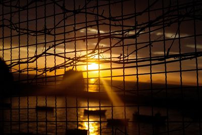 Silhouette of building at sunset