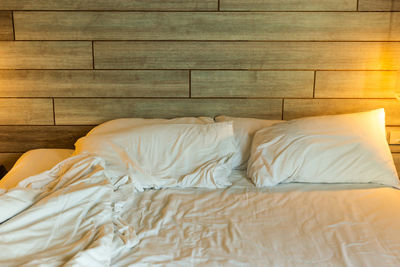 Midsection of blanket on bed at home