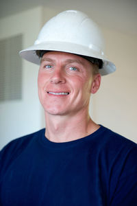 Portrait of man in hardhat