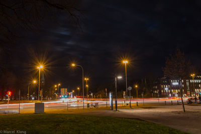 Illuminated street light at night