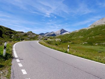 Surface level of empty road along countryside landscape