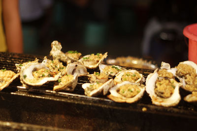 Close-up of food on barbecue grill