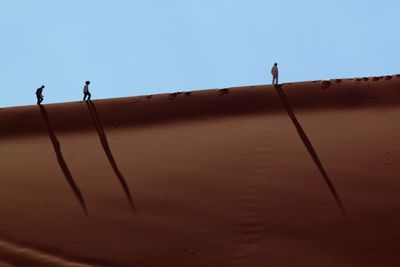 Low angle view of landscape against clear sky