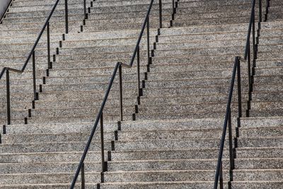 High angle view of staircase by wall