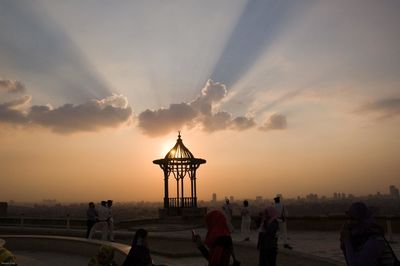 People walking against the sky