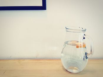 Close-up of water jar on table