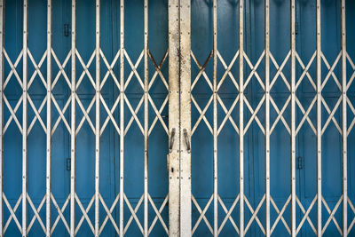 Full frame shot of closed metal gate