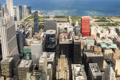 High angle view of cityscape by lake 