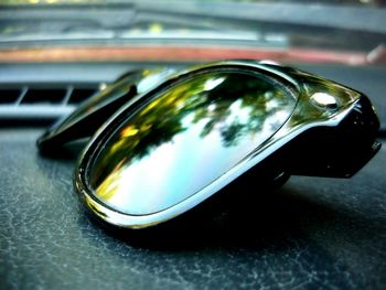 Close-up view of sunglasses in car