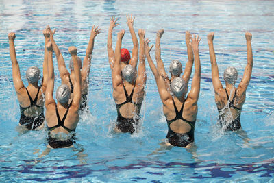 Group of people in swimming pool